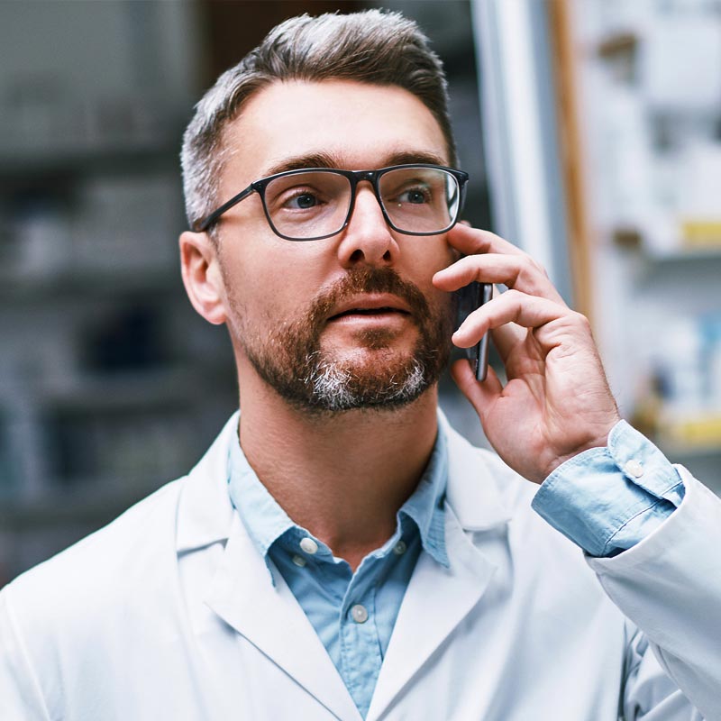 Pharmacist talking on the phone